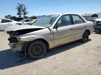  Salvage Mazda Protege